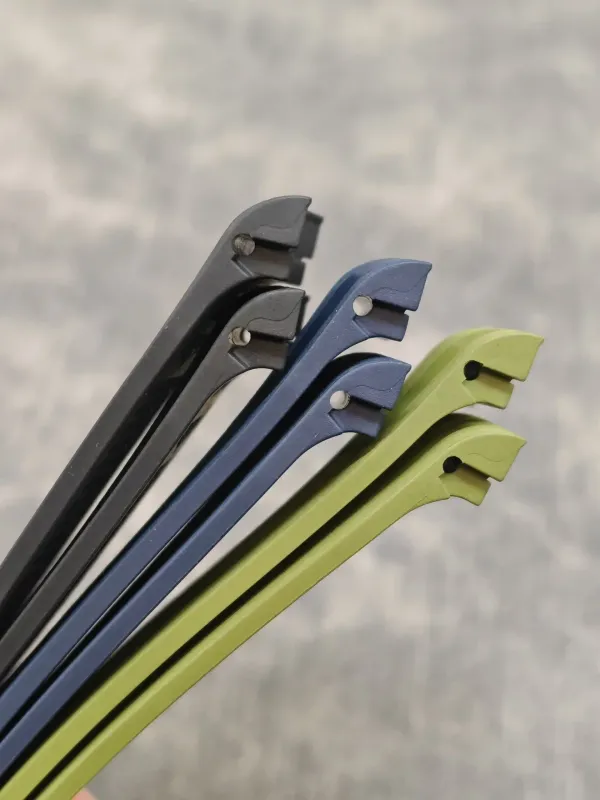 Curved strap ends for Longines Conquest GMT in black, blue and green, stacked together.