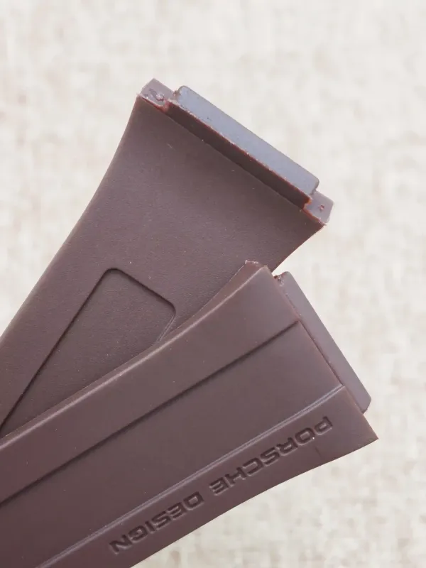 Close-up of the textured underside of a brown rubber strap for Porsche Design P6780.